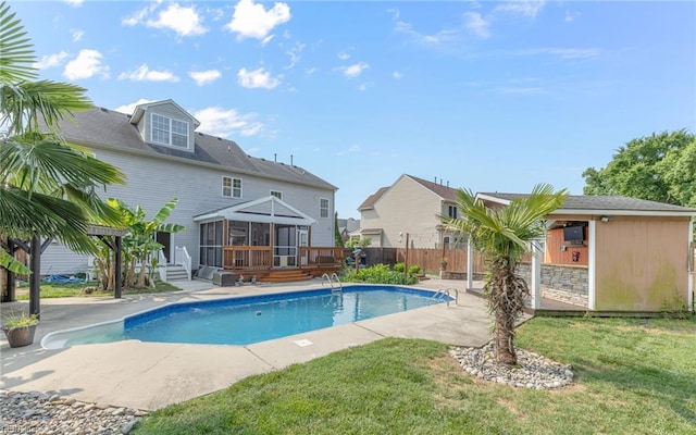 2129 Bierce Dr, Virginia Beach, VA 23454 - view of pool with a sunroom, a wooden deck, and an outdoor structure