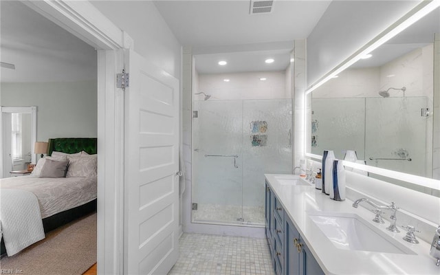 5312 Studeley Ave, Norfolk, VA 23508 - full bathroom featuring connected bathroom, a marble finish shower, double vanity, recessed lighting, and tile patterned floors