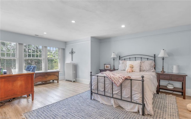 5312 Studeley Ave, Norfolk, VA 23508 - bedroom featuring radiator, wood finished floors, baseboards, and recessed lighting