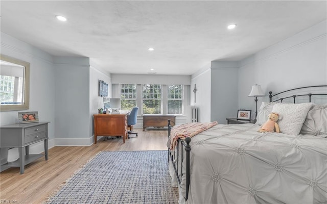 5312 Studeley Ave, Norfolk, VA 23508 - bedroom featuring wood finished floors, baseboards, recessed lighting, radiator heating unit, and an office area