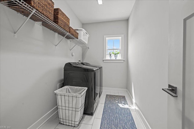 909 Los Colonis Dr, Virginia Beach, VA 23456 - laundry room featuring washing machine and clothes dryer and baseboards