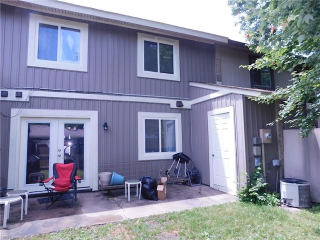 4193 Thistle Cir, Virginia Beach, VA 23462 - back of house featuring cooling unit, a patio, and french doors
