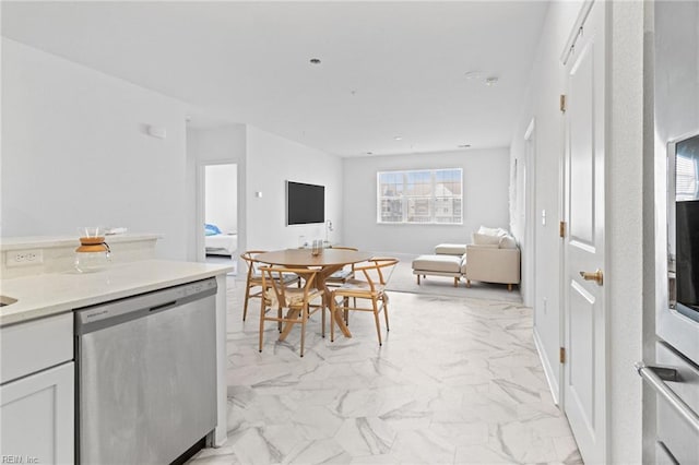 1733 Dromolin St Unit 205, Virginia Beach, VA 23456 - kitchen featuring stainless steel dishwasher, light marble finish flooring, open floor plan, and light countertops