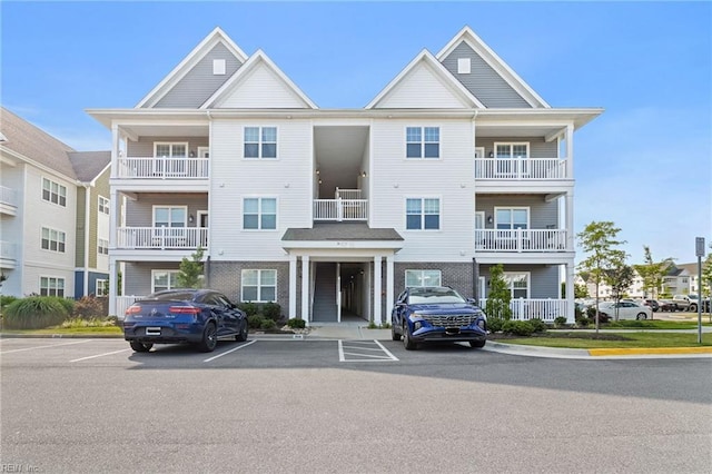 1733 Dromolin St Unit 205, Virginia Beach, VA 23456 - view of building exterior featuring uncovered parking