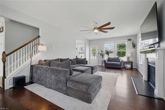 637 Wood Nymph Ln, Chesapeake, VA 23323 - living room with a ceiling fan, dark wood finished floors, stairs, and a fireplace