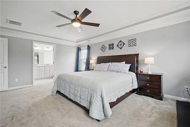 637 Wood Nymph Ln, Chesapeake, VA 23323 - carpeted bedroom featuring crown molding, baseboards, ceiling fan, ensuite bathroom, and a tray ceiling