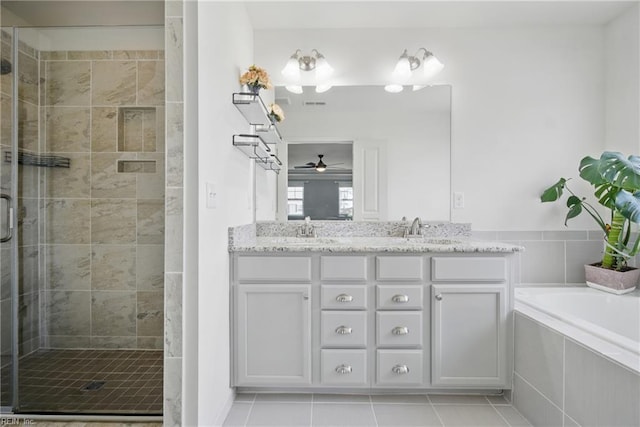 637 Wood Nymph Ln, Chesapeake, VA 23323 - full bathroom featuring a stall shower, double vanity, and a ceiling fan