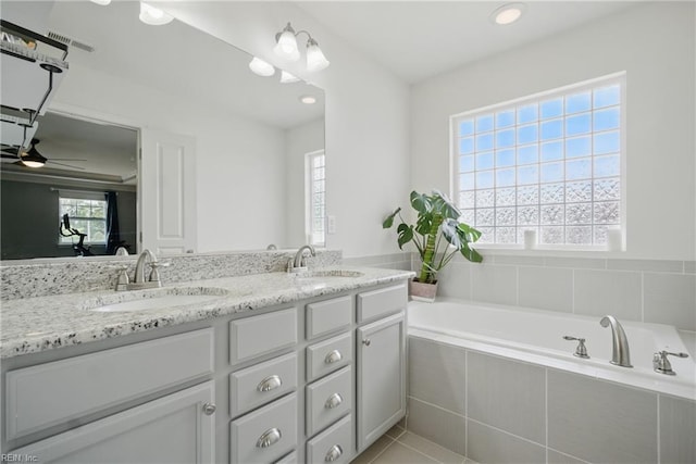 637 Wood Nymph Ln, Chesapeake, VA 23323 - full bath with a garden tub, double vanity, recessed lighting, ceiling fan, and tile patterned flooring
