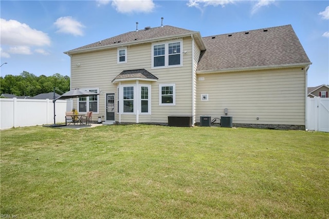 637 Wood Nymph Ln, Chesapeake, VA 23323 - back of property featuring central AC unit, a patio, and a shingled roof