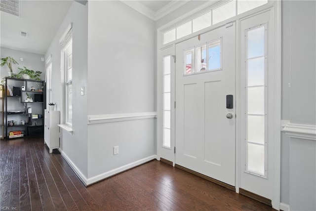 637 Wood Nymph Ln, Chesapeake, VA 23323 - entryway featuring dark wood finished floors, plenty of natural light, ornamental molding, and baseboards