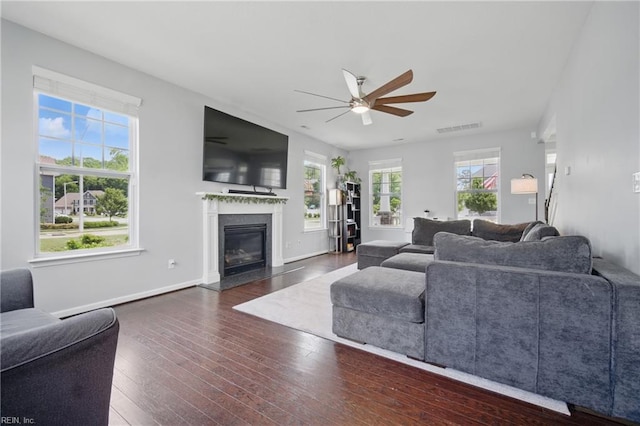 637 Wood Nymph Ln, Chesapeake, VA 23323 - living room featuring a ceiling fan, a fireplace with flush hearth, hardwood / wood-style floors, and baseboards
