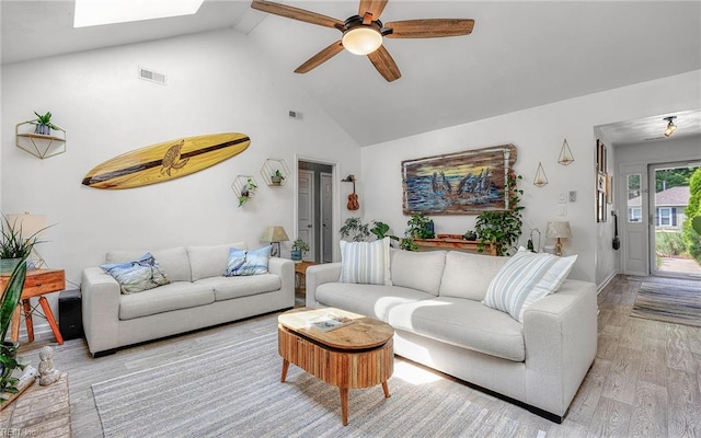 1813 Castleton Ct, Virginia Beach, VA 23454 - living room with high vaulted ceiling, a ceiling fan, light wood finished floors, baseboards, and a skylight
