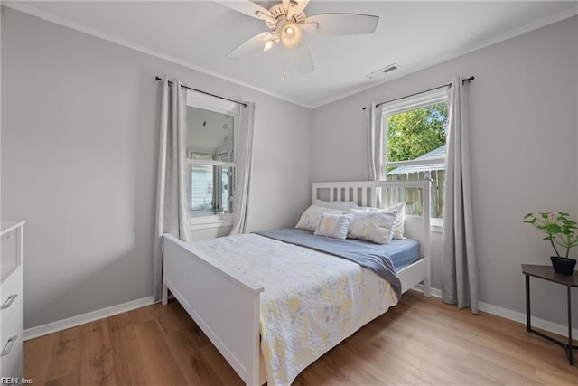423 Cedar Dr, Hampton, VA 23669 - bedroom with wood finished floors, baseboards, ornamental molding, and a ceiling fan
