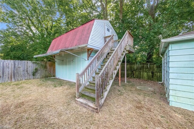 423 Cedar Dr, Hampton, VA 23669 - view of outdoor structure with stairs and a fenced backyard