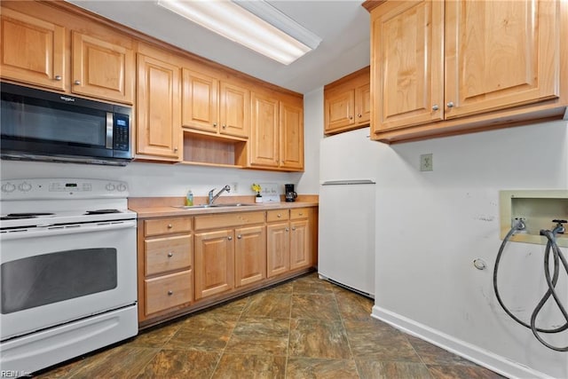 423 Cedar Dr, Hampton, VA 23669 - kitchen with white appliances, a sink, baseboards, light brown cabinets, and stone finish floors