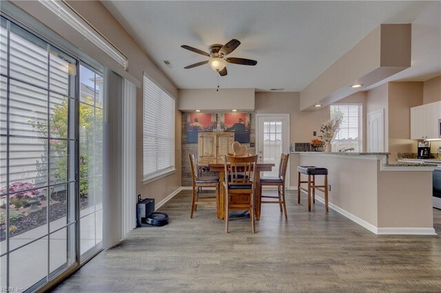 1808 Kensal Green Dr, Virginia Beach, VA 23456 - dining area with a ceiling fan, wood finished floors, and baseboards