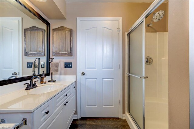 1808 Kensal Green Dr, Virginia Beach, VA 23456 - full bathroom with a stall shower, vanity, and wood finished floors