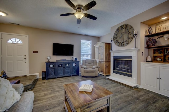 1808 Kensal Green Dr, Virginia Beach, VA 23456 - living room featuring a ceiling fan, healthy amount of natural light, wood finished floors, and a textured ceiling