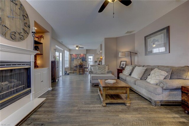 1808 Kensal Green Dr, Virginia Beach, VA 23456 - living area with a ceiling fan, wood finished floors, and a fireplace with raised hearth