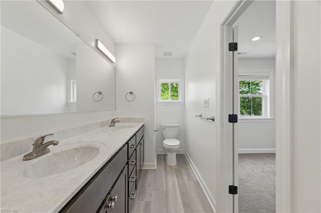 315 N Second St, Hampton, VA 23664 - bathroom with plenty of natural light, double vanity, toilet, and baseboards