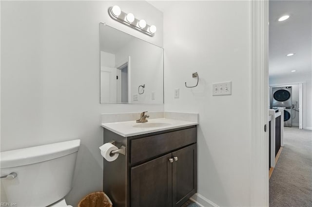 315 N Second St, Hampton, VA 23664 - half bath with stacked washer / dryer, toilet, vanity, recessed lighting, and baseboards