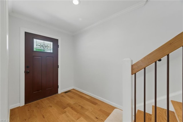 315 N Second St, Hampton, VA 23664 - foyer entrance with light wood-type flooring, ornamental molding, and baseboards
