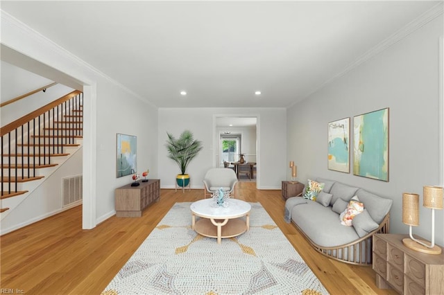 315 N Second St, Hampton, VA 23664 - living area featuring light wood-style floors, stairway, recessed lighting, crown molding, and baseboards