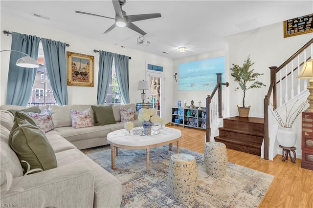 245 Feldspar St, Virginia Beach, VA 23462 - living room featuring stairs, healthy amount of natural light, and wood finished floors
