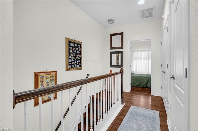 245 Feldspar St, Virginia Beach, VA 23462 - hallway with an upstairs landing, dark wood finished floors, and baseboards