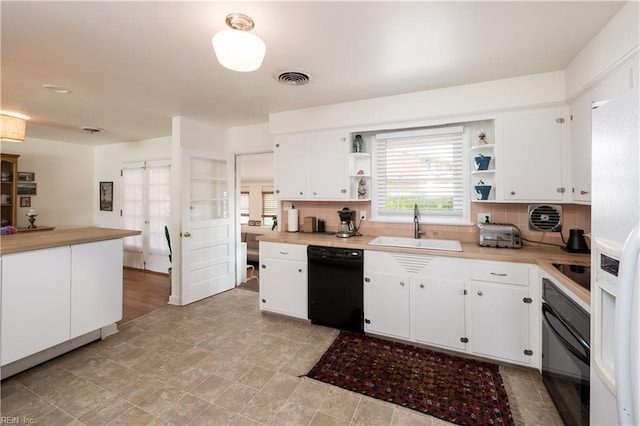 2522 Jasper Ct, Norfolk, VA 23518 - kitchen featuring black appliances, open shelves, a sink, and light countertops