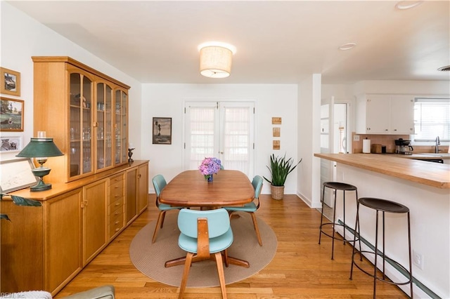 2522 Jasper Ct, Norfolk, VA 23518 - dining area featuring light wood-style flooring and baseboards