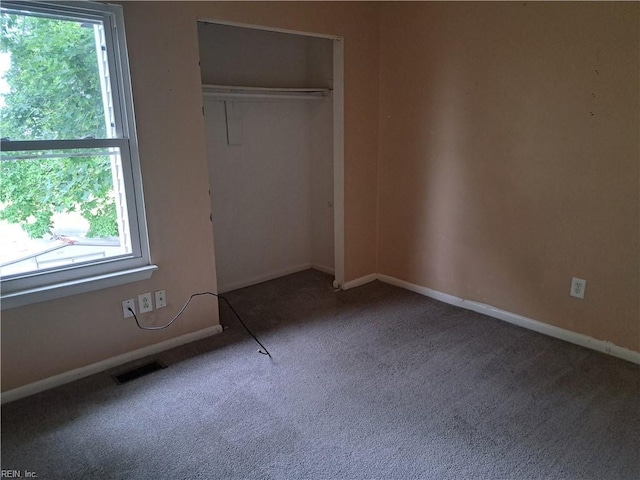 1002 Barnacle Ct, Virginia Beach, VA 23451 - unfurnished bedroom featuring carpet, a closet, and baseboards