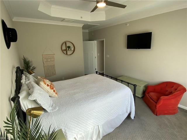 1010 Kings Land Ct, Williamsburg, VA 23185 - bedroom with a tray ceiling, carpet, ornamental molding, attic access, and a ceiling fan