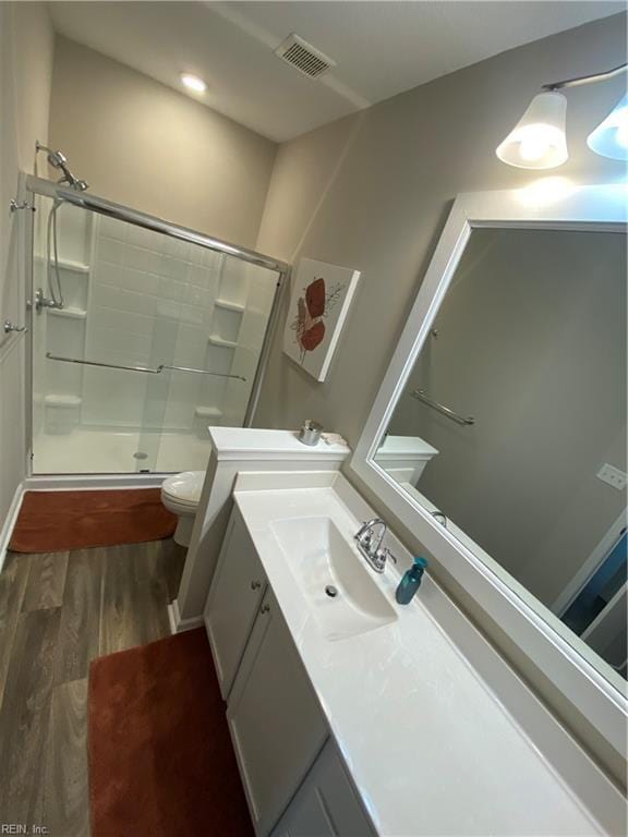 1010 Kings Land Ct, Williamsburg, VA 23185 - full bathroom with vanity, wood finished floors, and a shower