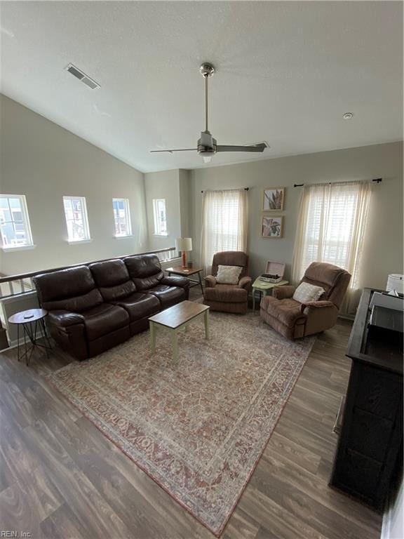 1010 Kings Land Ct, Williamsburg, VA 23185 - living area with lofted ceiling, dark wood-style floors, healthy amount of natural light, and ceiling fan
