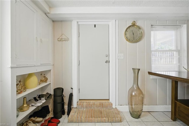 5133 E Princess Anne Rd, Norfolk, VA 23502 - foyer entrance featuring light tile patterned flooring and a textured ceiling