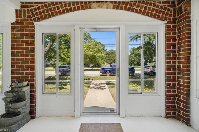 5133 E Princess Anne Rd, Norfolk, VA 23502 - entryway with healthy amount of natural light and brick wall