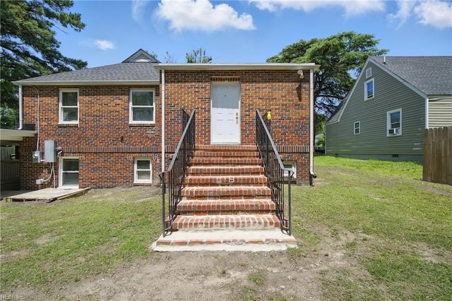 5133 E Princess Anne Rd, Norfolk, VA 23502 - view of front of home with a front yard, brick siding, and entry steps