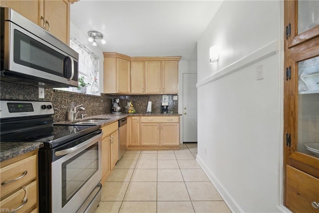 5133 E Princess Anne Rd, Norfolk, VA 23502 - kitchen featuring stainless steel appliances, light brown cabinets, a sink, light tile patterned flooring, and tasteful backsplash