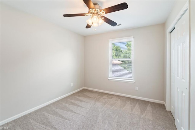 230 Abingdon Cir, Suffolk, VA 23434 - unfurnished bedroom with a closet, light colored carpet, and baseboards