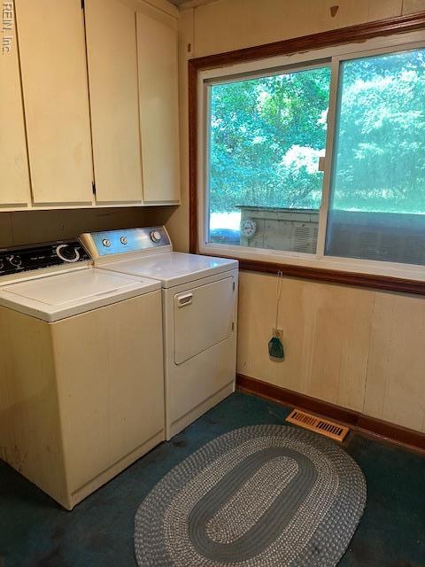 5216 Hemlock Rd, Quinton, VA 23141 - laundry room featuring separate washer and dryer and cabinet space