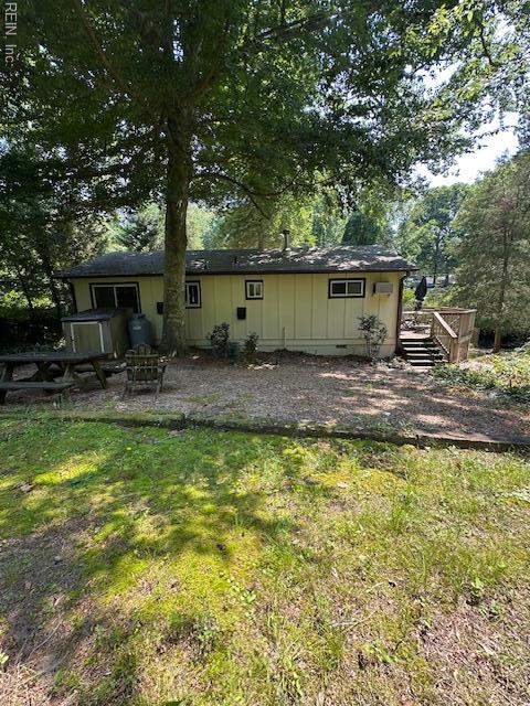 5216 Hemlock Rd, Quinton, VA 23141 - rear view of house with a wooden deck and view of scattered trees