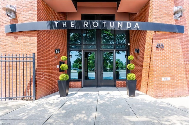 415 Saint Pauls Blvd Unit 702, Norfolk, VA 23510 - view of exterior entry with french doors and brick siding