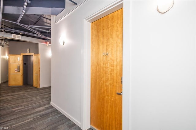 415 Saint Pauls Blvd Unit 702, Norfolk, VA 23510 - hallway with elevator, baseboards, and wood finished floors