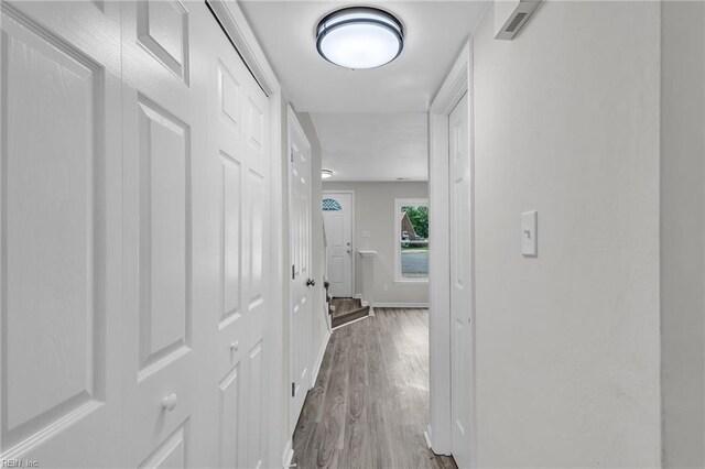 3905 Raintree Ct, Chesapeake, VA 23321 - hallway featuring wood finished floors and baseboards