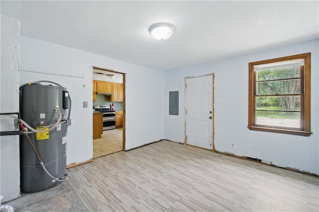 3555 Heutte Dr, Norfolk, VA 23518 - kitchen featuring stainless steel electric stove, electric panel, water heater, and brown cabinetry