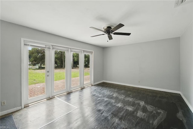 3555 Heutte Dr, Norfolk, VA 23518 - unfurnished room with baseboards, a ceiling fan, and wood finished floors