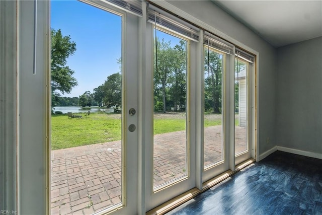 3555 Heutte Dr, Norfolk, VA 23518 - doorway to outside with a water view and baseboards