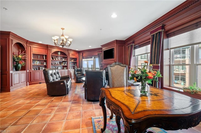 3248 Page Ave Unit 203, Virginia Beach, VA 23451 - dining room featuring a chandelier, plenty of natural light, light tile patterned floors, recessed lighting, and built in shelves