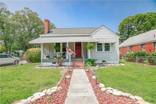 327 Brightwood Ave, Hampton, VA 23661 - bungalow-style house featuring a porch, crawl space, and a chimney